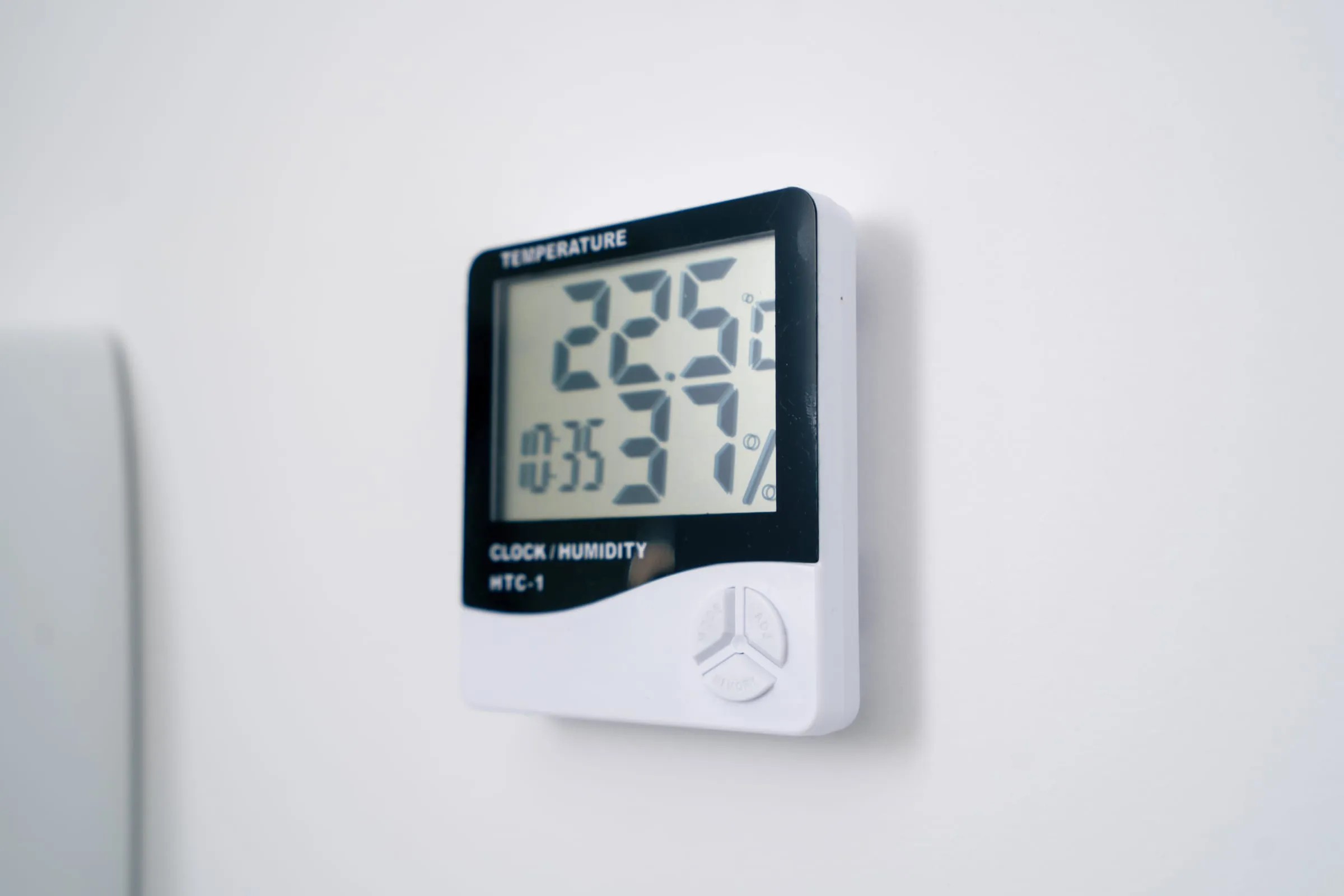 Digital thermometer display on a wall
