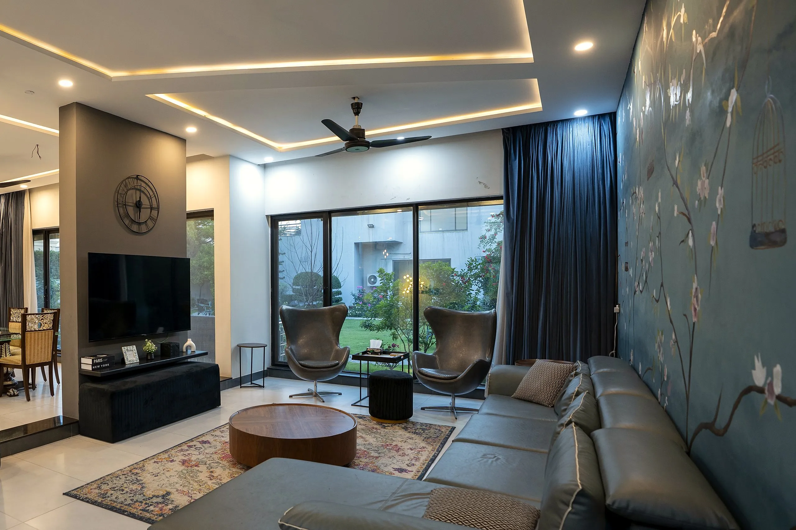 Living room opening to the garden at the Ultra Edge Experience Studio