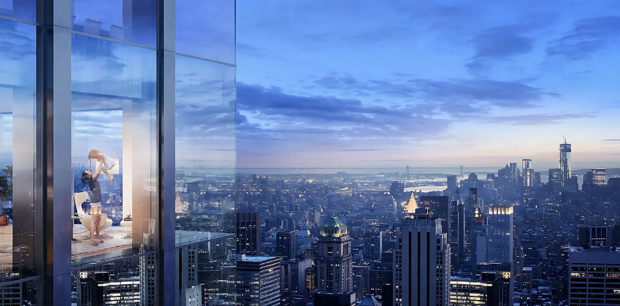 City skyline at night seen from a high-rise interior