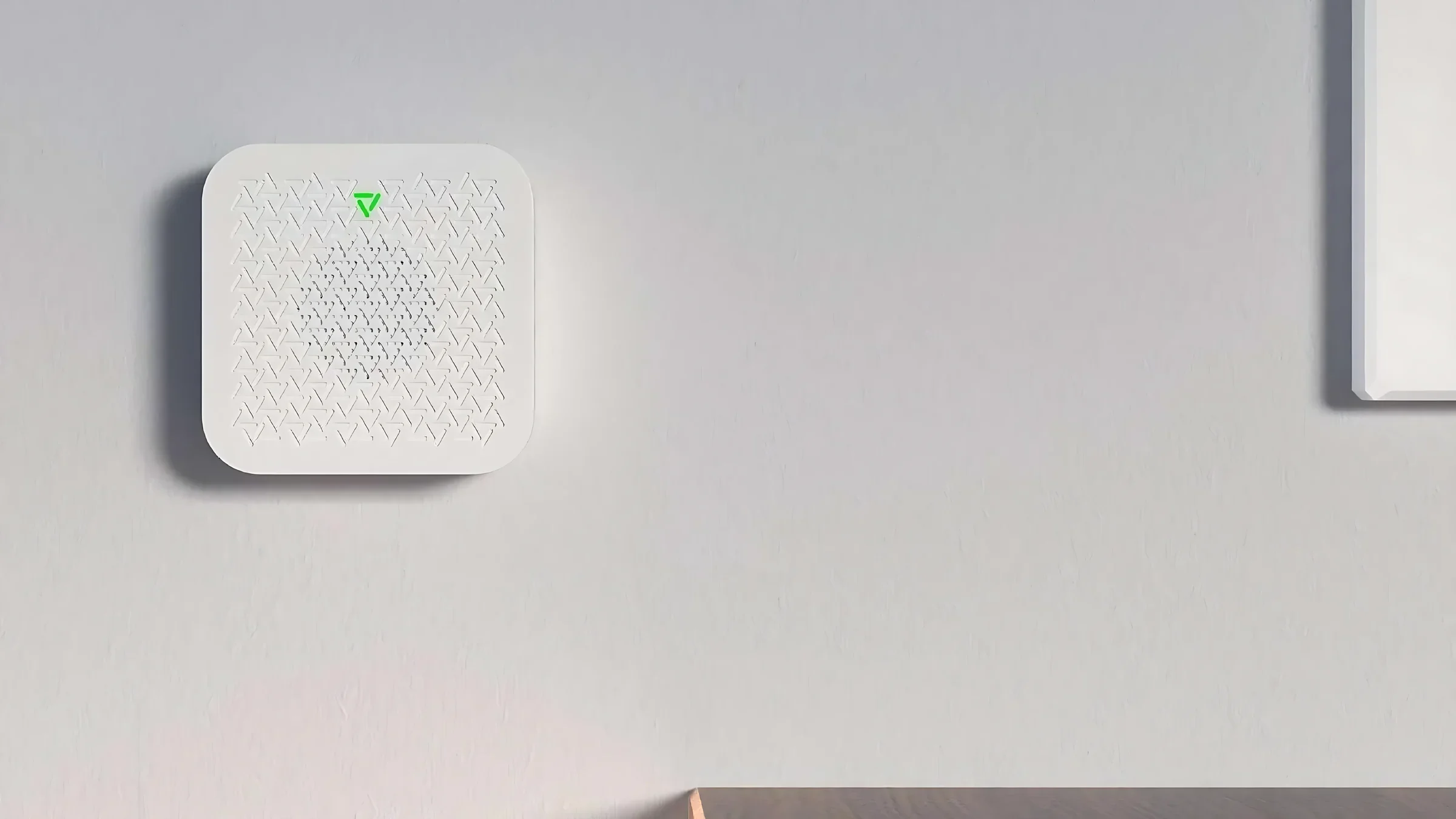 White indoor siren on a light wall
