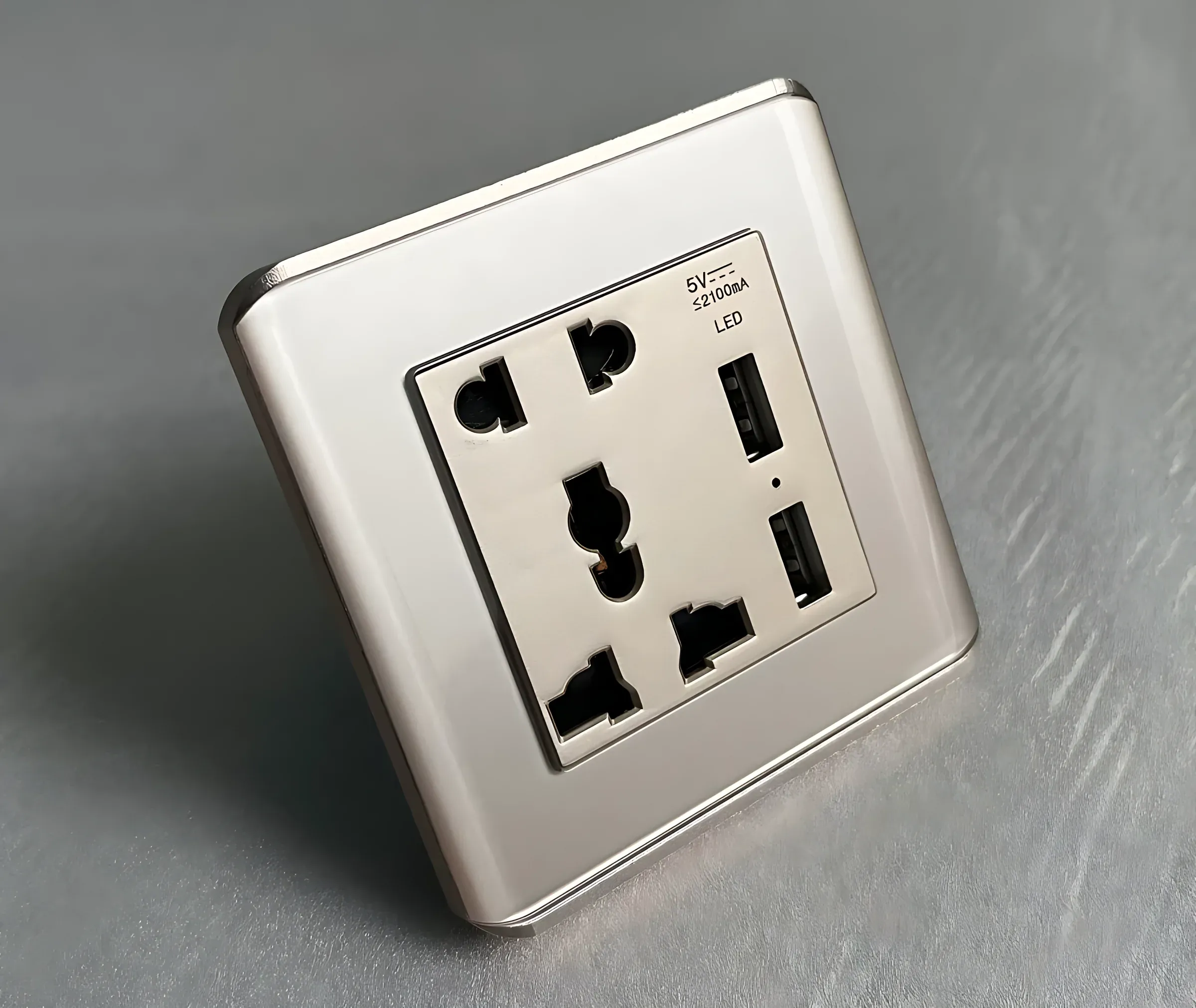 Champagne universal socket with USB, angled view