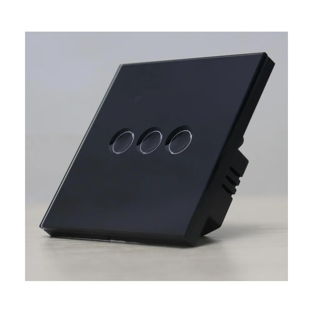 Black glass 3-gang smart switch with framed edge, angled view